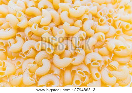Yellow Dry Pasta And Spaghetti Textures Background For Italian Food Ingredient