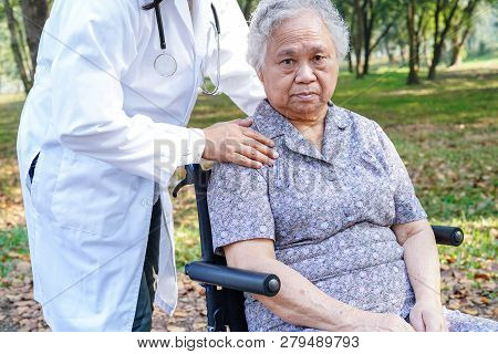 Doctor Help And Care Asian Senior Or Elderly Old Lady Woman Patient Sitting On Wheelchair At Nursing