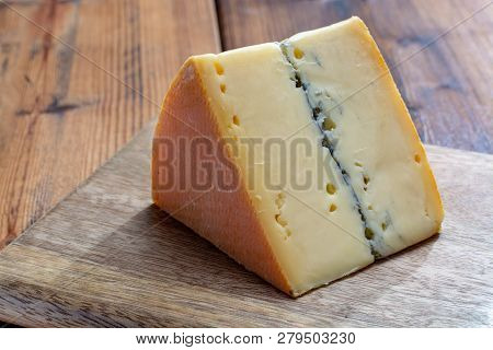 French Semi-soft Cow Milk Cheese Morbier From Franche-comte Region With Thin Black Layer And Strong