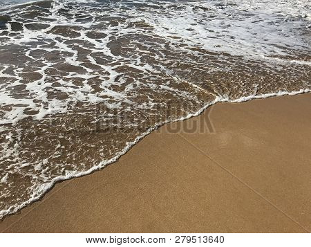 Water Meets Sand On The Coast In Maui