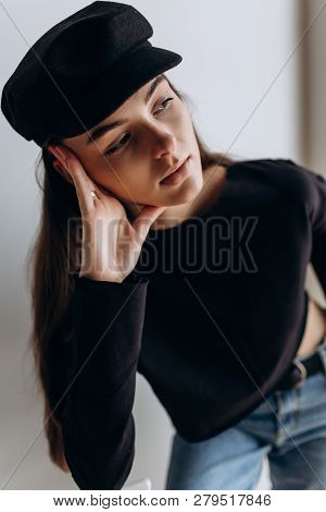Beautiful Girl In A Black Cap, Black Golf, Blue Jeans! Natural Light, Smart Casua, Street Casual