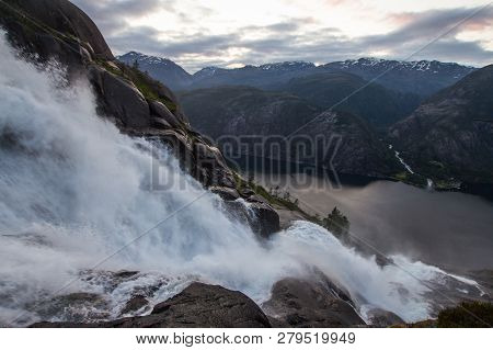Summer Mountain Langfossen Waterfall On Slope Etne, Norway.