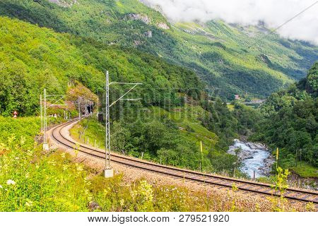Magnificent Summer Views In Of The Railway And A Hiking Road Connecting The Flam And Murdal. Most Be