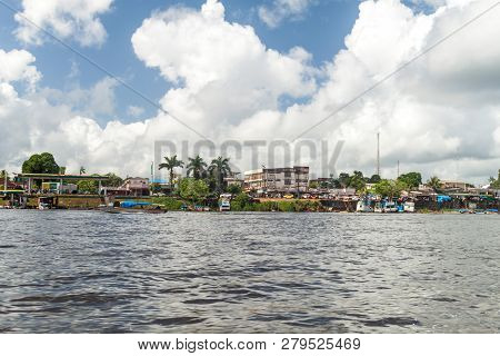Oiapoque, Brazil - August 1, 2015: Rierside Buildings Of Oiapoque Town On Oiapok Oiapoque Or Oyapock
