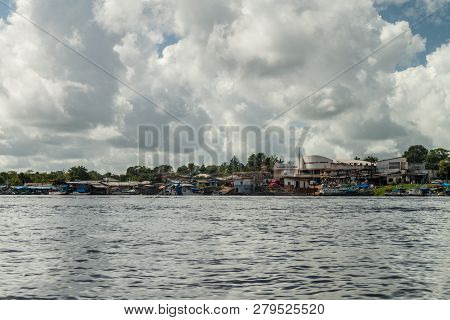 Oiapoque, Brazil - August 1, 2015: Rierside Buildings Of Oiapoque Town On Oiapok Oiapoque Or Oyapock