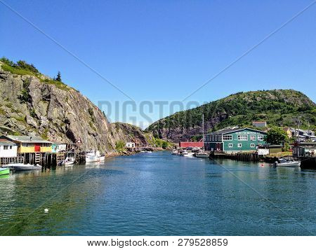 Quidi Vidi, Newfoundland, Canada - July 13th, 2014: The Popular Tourist Landmark, And Small Fishing 