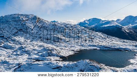 Greenland nature mountain landscape aerial drone photo showing amazing greenland landscape near Nuuk of Nuup Kangerlua fjord seen from Ukkusissat mountain. Tourist adventure travel destination