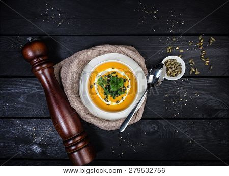 Pumpkin Soup With Jusai And Fried Cilantro.