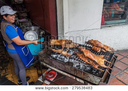 Banos, Ecuador - June 20, 2015: Roasted Guinea Pigs On A Market In Banos De Agua Santa, Popular Tour