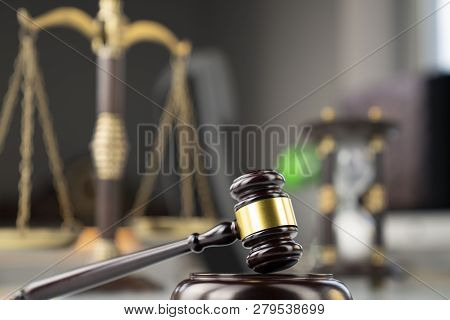 Lawyers Office. Gavel And Scale  On The White Table.