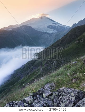 Mount Elbrus In The Rays Of Sunset. Russia, Kabardino-balkaria, Elbrus Region, Terskol.