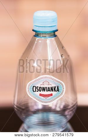 Poznan, Poland - November 17, 2018: Top Of A Polish Cisowianka Water Bottle In Soft Focus.
