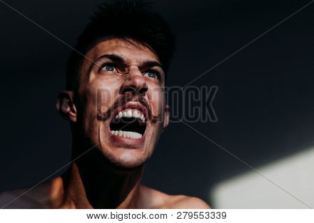 Young Angry Man Expressing Negative Emotion Shoting
