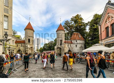 Tallinn, Estonia - September 10 2018: Tourists Leave The Medieval Old Town Of Tallinn Estonia Throug
