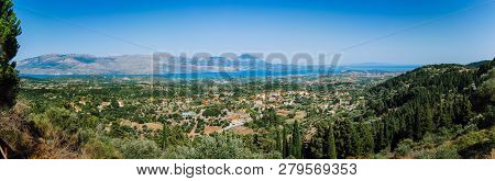 Ultra Wide Panormaic View Of Idyllic Valley Town With Red Roofs On Mediterranean Island. Olive Grove