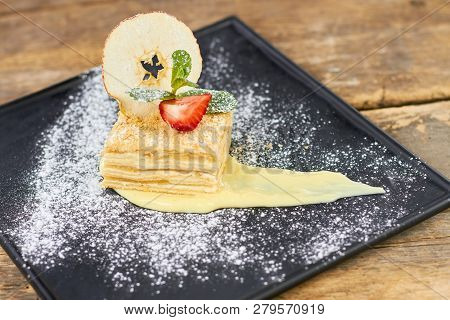 French Cake With Cream And Flour, Top View. Delicious French Napoleon Professionally Served.