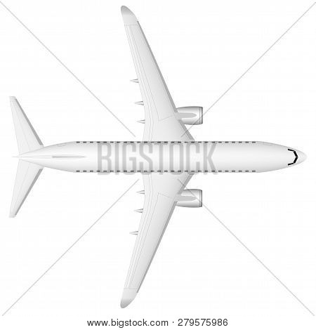 A Modern Jet Passenger White Plane On The Runway. View From Above. A Well-designed Image With A Mass