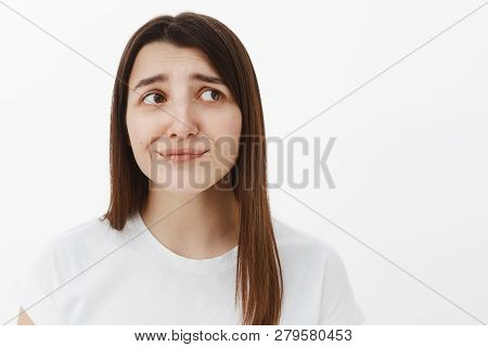 Girl Expected Different, Being Displeased And Unimpressed Smirking Disappointed Frowning And Grimaci