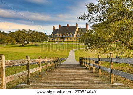 The footbridge in Heritage Park in Corolla on the Outer Banks in North Carolina is a historic landmark.  It connects the walkway to the Whalehead Club.  Currituck is on the sound.