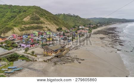 La Entrada, Ecuador - September 14, 2018 - Drone Aeiral View Of Colorful Coastal Town From The Beach