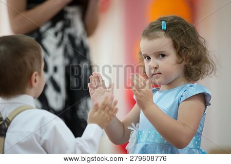 Belarus, Gomel, May 24 2018. The Kindergarten Is Central. Open Day.little Girl And Boy Dancing On Th