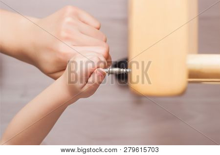 Mother And Child Are Assembling A Crib, Close-up, Caucasian, Assembly