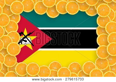 Mozambique Flag  In Fresh Citrus Fruit Slices Frame