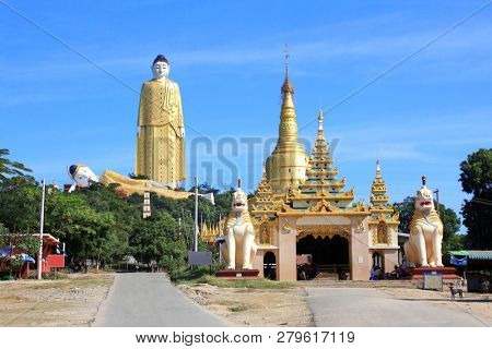 Giant standing Buddha skyscraper (170 m high) and temple in the form of a reclining Buddha, Monywa, Sagaing Division, Myanmar