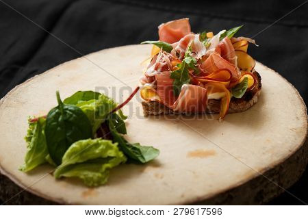 Close Up Sandwich With Jamon And Salad On Board. Sandwich With Jamon And Apple, Salad. Delicious Lun