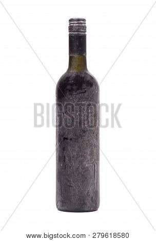 Old Bottle Of Wine, Covered In Dust