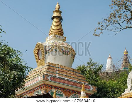 Small Stupa At The Southeastern Foot Of The Swayambu Hill On A Background Of Swayambhunath Temple Co