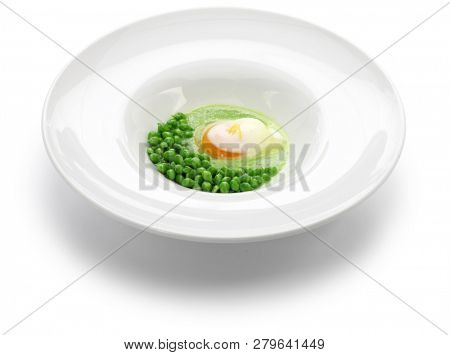 tear peas with poached egg, spanish basque cuisine