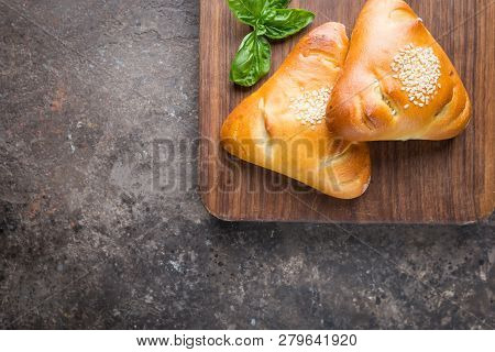 Homemade Chicken And Mushroom Mini Pies On Cutting Board, Top View
