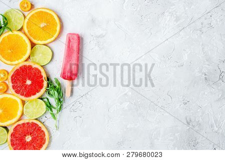 Citrus Popsicles With Fruit Slices On Stone Background Top View Mockup