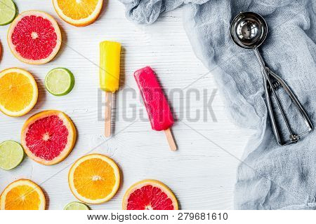 Orange Icecream With Fruits On Table Background Top View