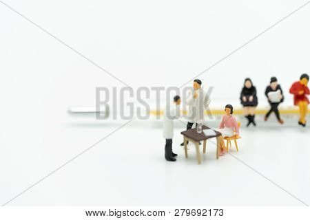 Miniature People Consult A Doctor To Ask For Health Problems. Annual Health Check Or Consult A Docto