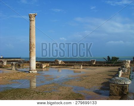 Carthage, Tunisia - April 12, 2018: Ruins Of Bathhouse Of Carthage And View To Mediterranean Sea, Tu