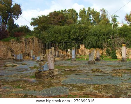Carthage, Tunisia - April 12, 2018: Ruins Of Bathhouse Of Carthage And View To Mediterranean Sea, Tu