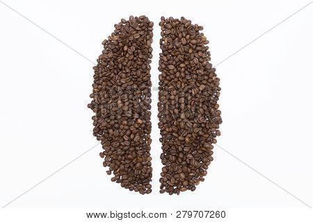 Roasted Coffee Beans Poured In The Form Of Coffee Beans