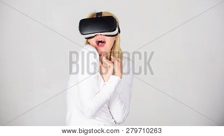 Woman Using Virtual Reality Headset. A Person In Virtual Glasses Flies In Room Space. Pretty Woman P