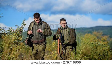 Army Forces. Camouflage. Military Uniform. Man Hunters With Rifle Gun. Boot Camp. Hunting Skills And