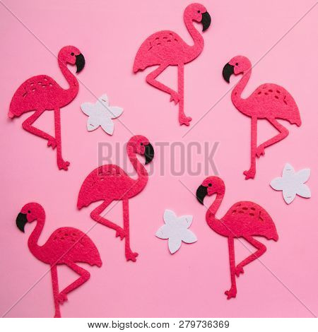Many Flamingos And Flowers On A Pink Background In Minimal Style.