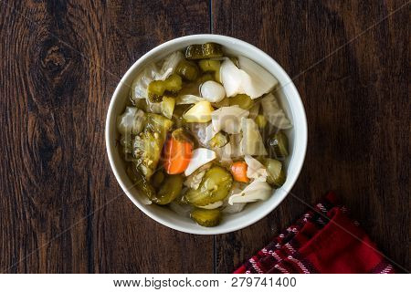 Mix Of Turkish Pickles With Hot Green Pepper, Cabbage, Sauerkraut, Carrot And Cucumber In Bowl.