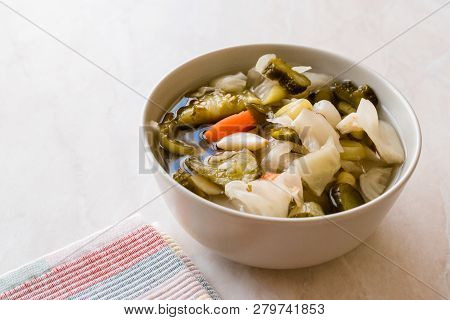 Mix Of Turkish Pickles With Hot Green Pepper, Cabbage, Sauerkraut, Carrot And Cucumber In Bowl.