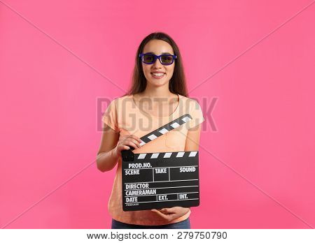 Woman With 3d Glasses And Clapperboard On Color Background. Cinema Show