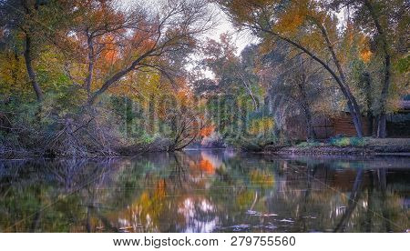 Quiet Forest Lake In The Autumn Evening.