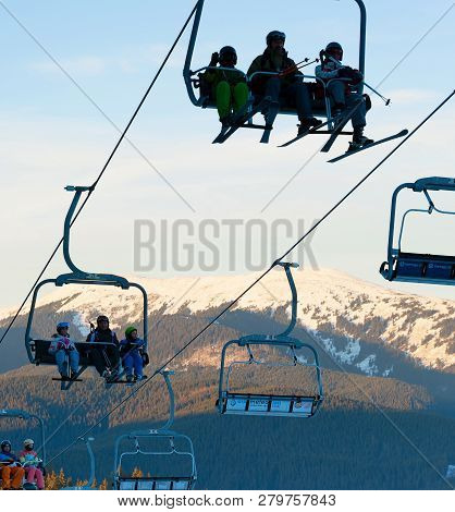 Bukovel, Ukraine - Dec 08, 2015: People On A Ski Lift In Bukovel. Bukovel Is The Most Popular Ski Re