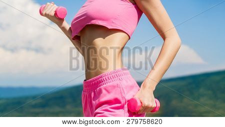 Fitness Woman In Training. Sporty Woman Does The Exercises With Dumbbells. Sports Fitness Sexy Girl,