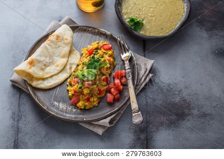 Indian Style Scrambled Eggs Akuri With Paratha, Dahl And Ice Tea, Copy Space