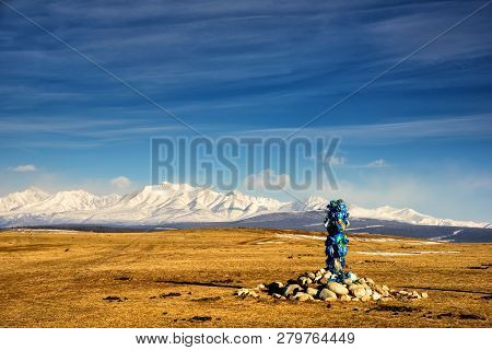 Sacred Place With Obo. Winter Landscape Of Mongolia. Lake Khubsugul And Mountain